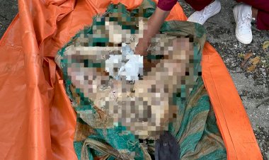 Diduga-Mayat-Berjenis-Kelamian-Perempuan,-Ditemukan-Tanpa-Kepala-dan-Badan- di-Muara-Pantai-Oli'o-Kelurahan-Merdeka