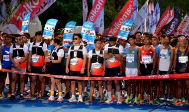 Kapolda-NTT-Turut-Meriahkan-Kupang-Exotic-Run-2025,-Warnai-Peringatan-HUT-Bhayangkara-ke-79