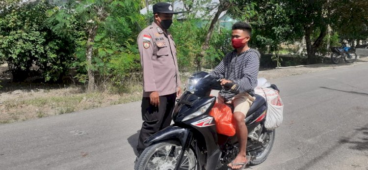 Polisi Terus Ingatkan Masyarakat Tetap Patuhi Protokol Kesehatan Covid-19