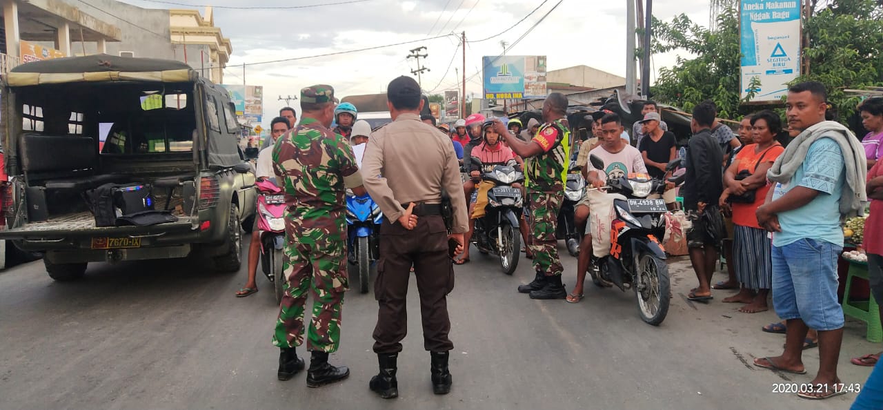 Sinergitas Polri - TNI cegah covid- 19 lakukan sosialisasi kepada masyarakat